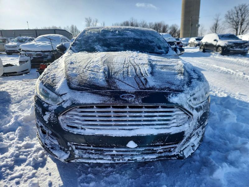 Photo 5 from auction – 2016 FORD FUSION with VIN 3FA6P0K93GR150931