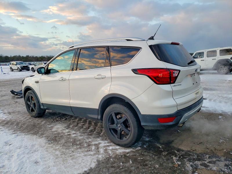 Photo 2 from auction – 2019 FORD ESCAPE TIT with VIN 1FMCU9J91KUB91339