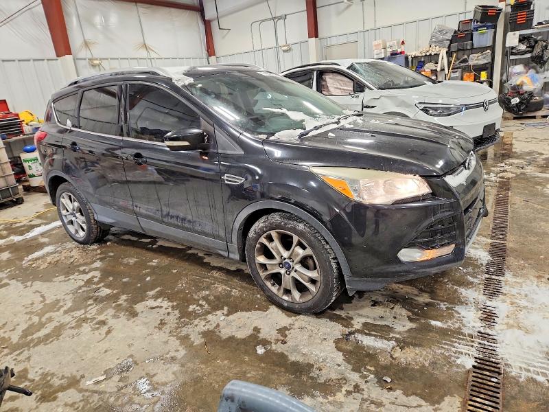 Photo 4 from auction – 2015 FORD ESCAPE with VIN 1FMCU0JX6FUB31119