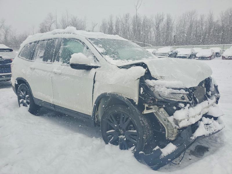 Photo 4 from auction – 2022 HONDA PILOT BLAC with VIN 5FNYF6H79NB015711