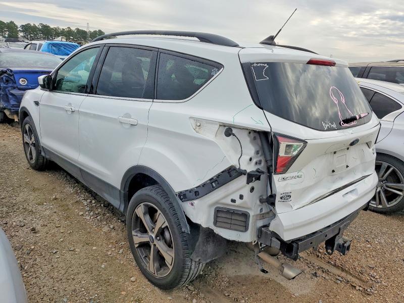 Photo 2 from auction – 2018 FORD ESCAPE with VIN 1FMCU9HD8JUD59602