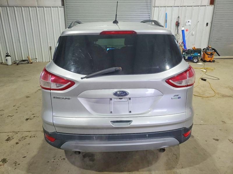 Foto 6 de la subasta – 2016 FORD ESCAPE con VIN 1FMCU9GX3GUC04329