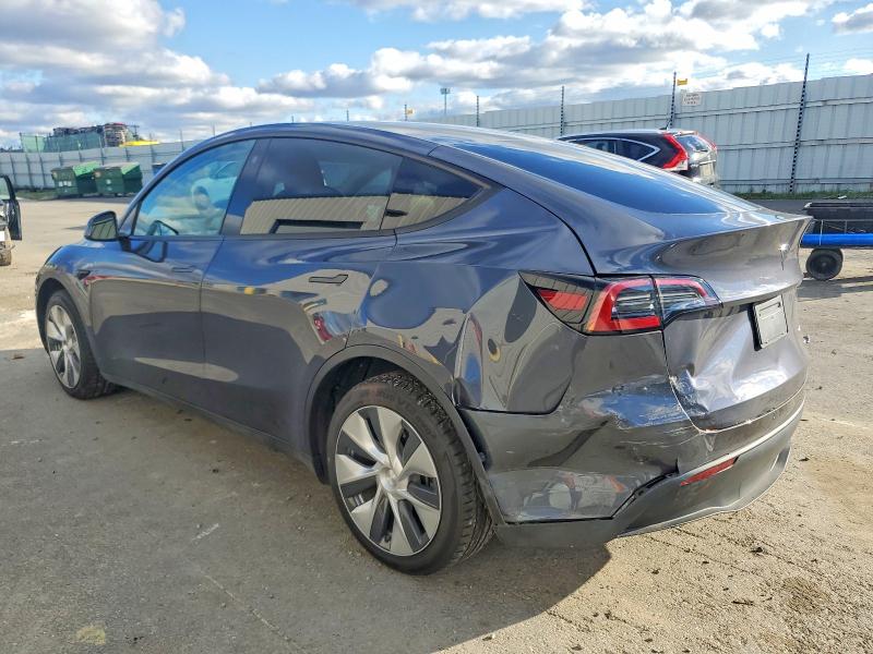 Photo 2 from auction – 2023 TESLA MODEL Y with VIN 7SAYGAEE4PF612385