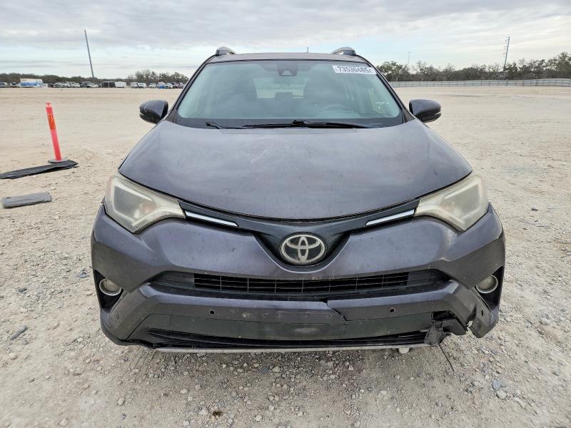 Photo 5 from auction – 2017 TOYOTA RAV4 XLE with VIN JTMWFREV1HJ113219