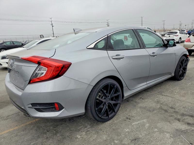 Photo 3 from auction – 2017 HONDA CIVIC EXL with VIN 2HGFC1F70HH644361