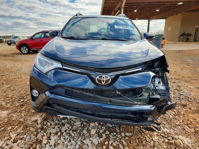 Photo 5 from auction – 2017 TOYOTA RAV4 XLE with VIN 2T3WFREV9HW377077
