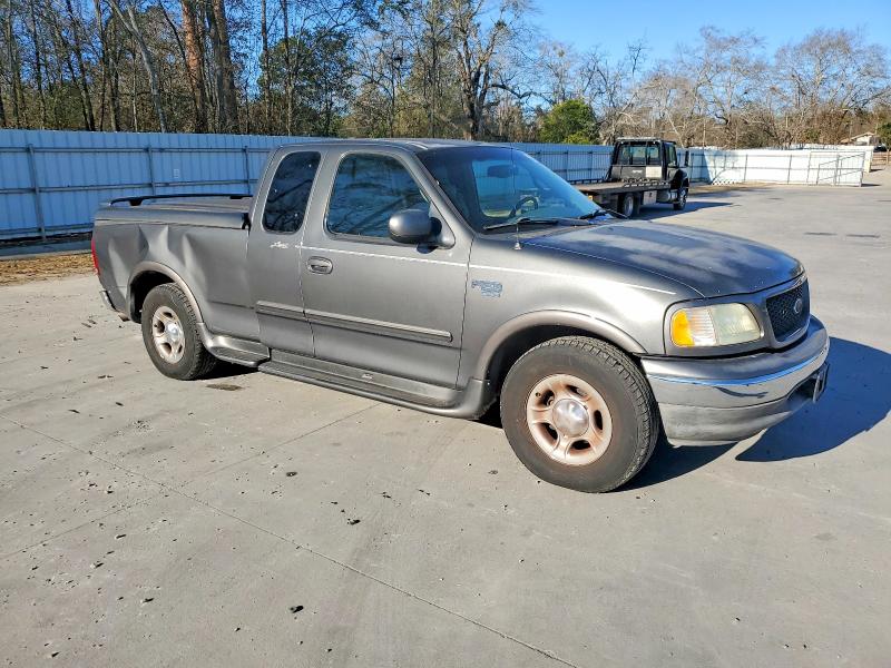 Photo 4 from auction – 2002 FORD F150 with VIN 1FTRX17L02NA13121