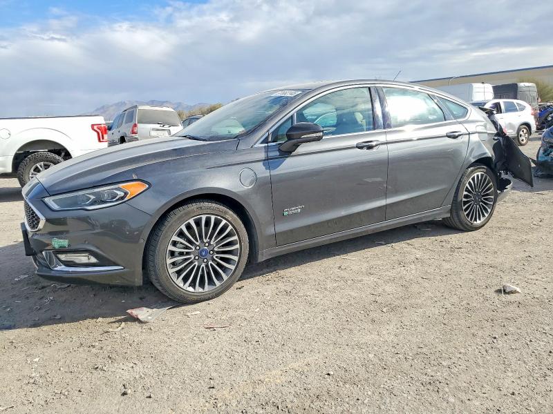 FORD FUSION TIT 2017 with VIN 3FA6P0SU6HR379996 - Photo from auction