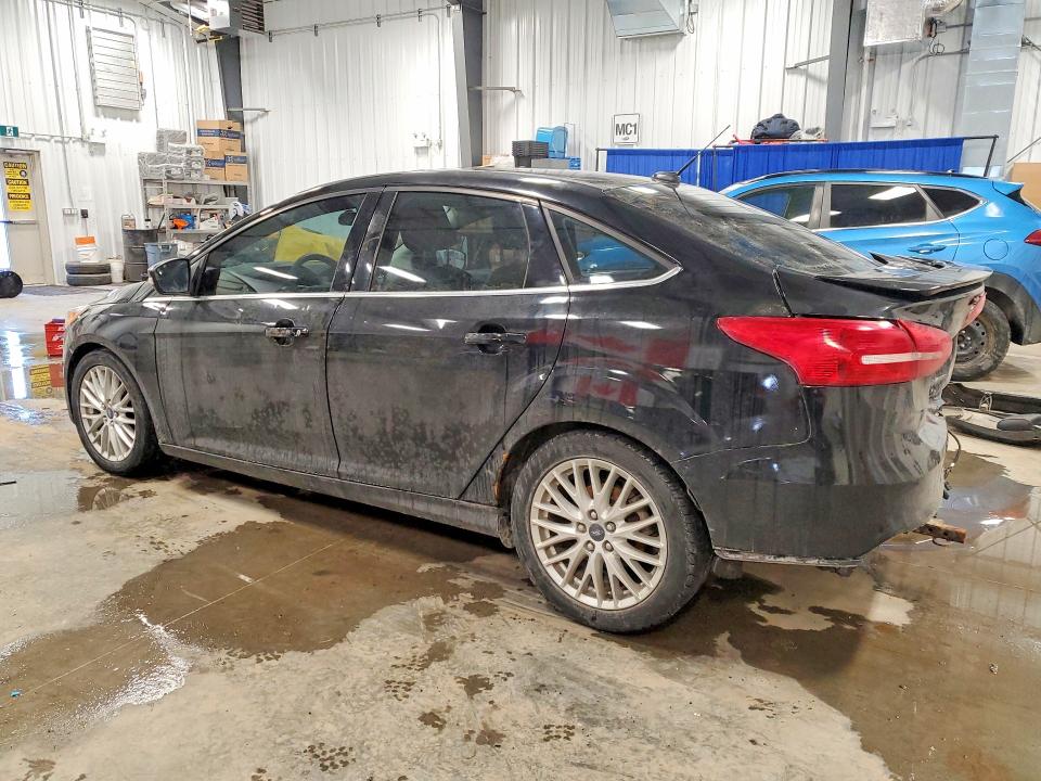 Photo 2 from auction – 2016 FORD FOCUS with VIN 1FADP3J27GL317027