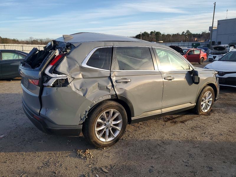 Photo 3 from auction – 2024 HONDA CR-V EXL with VIN 5J6RS3H73RL001072