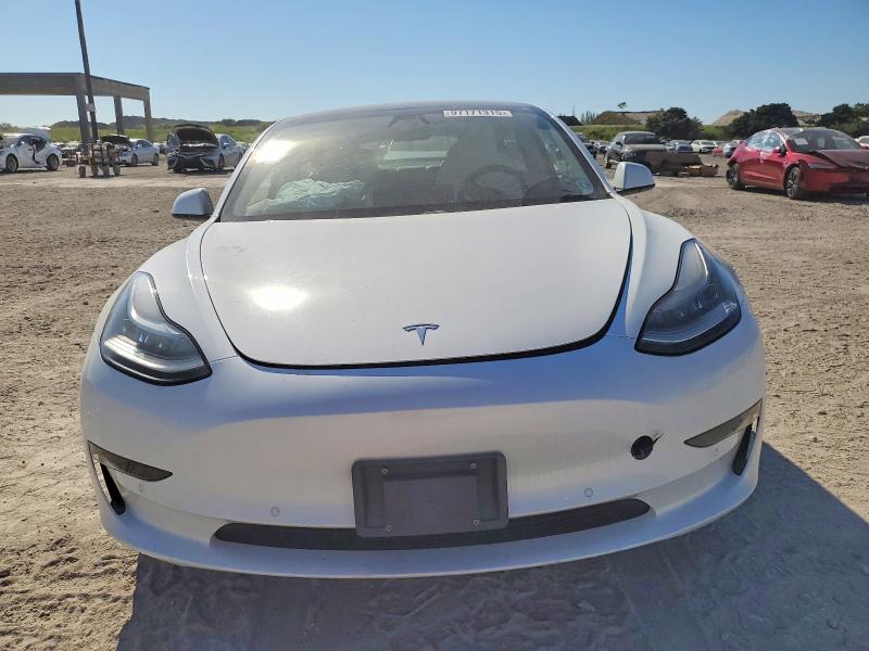 Photo 5 from auction – 2021 TESLA MODEL 3 with VIN 5YJ3E1EBXMF852779