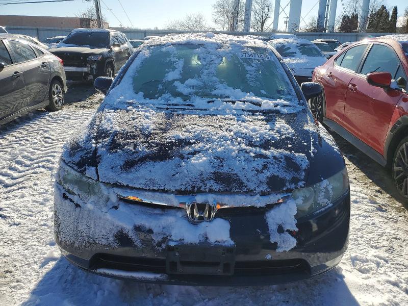 Photo 5 from auction – 2006 HONDA CIVIC LX with VIN 1HGFA16586L068085