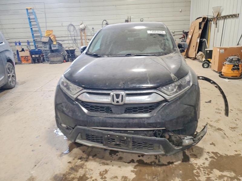 Photo 5 from auction – 2018 HONDA CR-V EXL with VIN 7FARW2H89JE087593