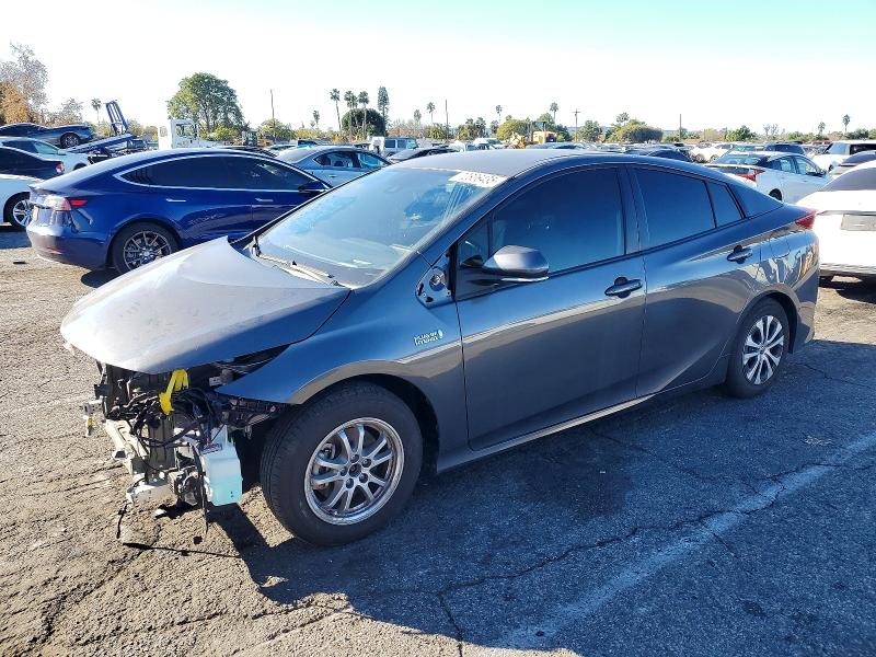 TOYOTA PRIUS PRIM 2021 with VIN JTDKAMFP6M3167906 - Photo from auction