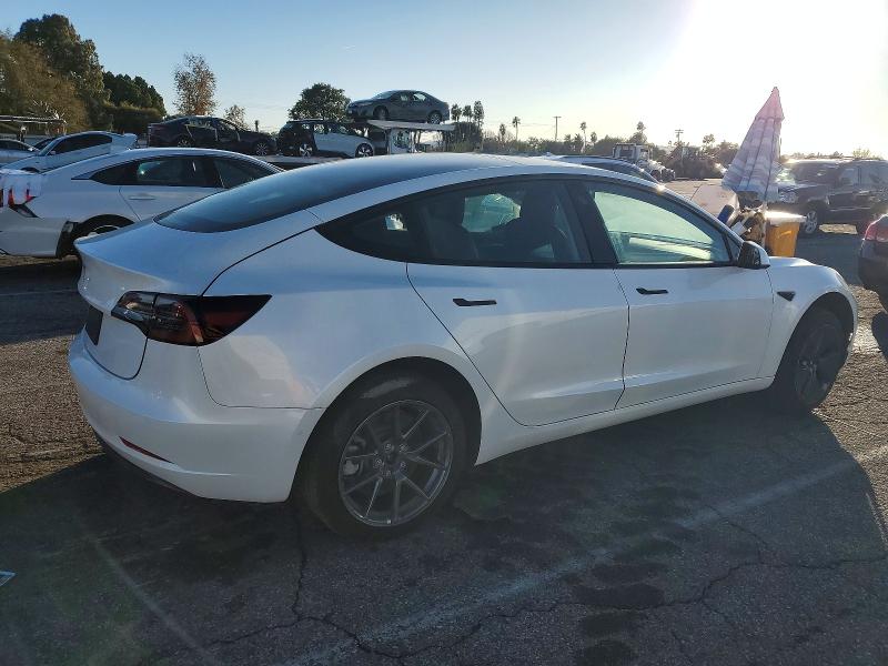 Photo 3 from auction – 2022 TESLA MODEL 3 with VIN 5YJ3E1EA9NF113637