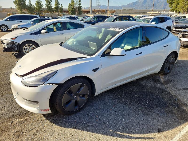 TESLA MODEL 3 2021 with VIN 5YJ3E1EAXMF021385 - Photo from auction