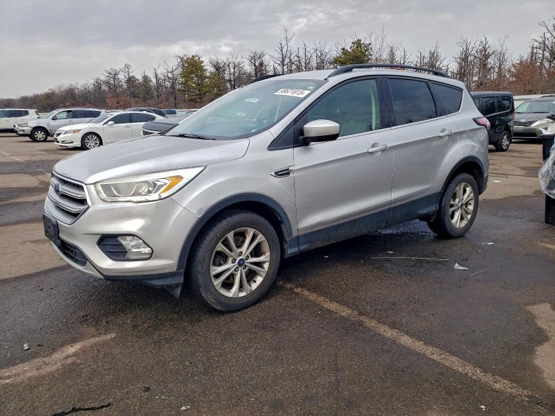 FORD ESCAPE SE 2017 with VIN 1FMCU9GD5HUE43856 - Photo from auction