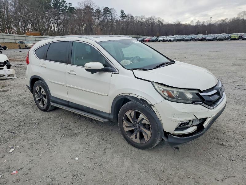 Photo 4 from auction – 2016 HONDA CR-V TOURI with VIN 5J6RM4H96GL127117