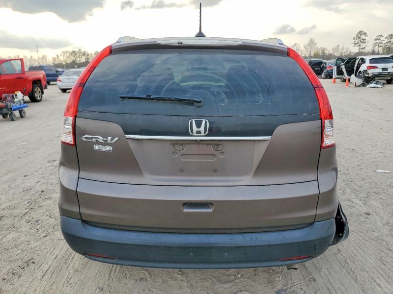 Photo 6 from auction – 2014 HONDA CR-V with VIN 2HKRM3H73EH545263