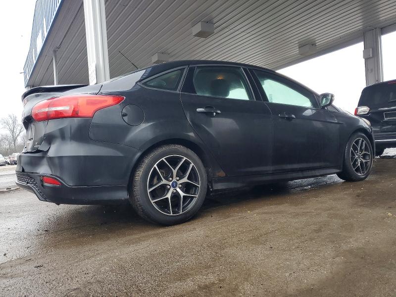 Photo 3 from auction – 2015 FORD FOCUS SE with VIN 1FADP3F21FL286915
