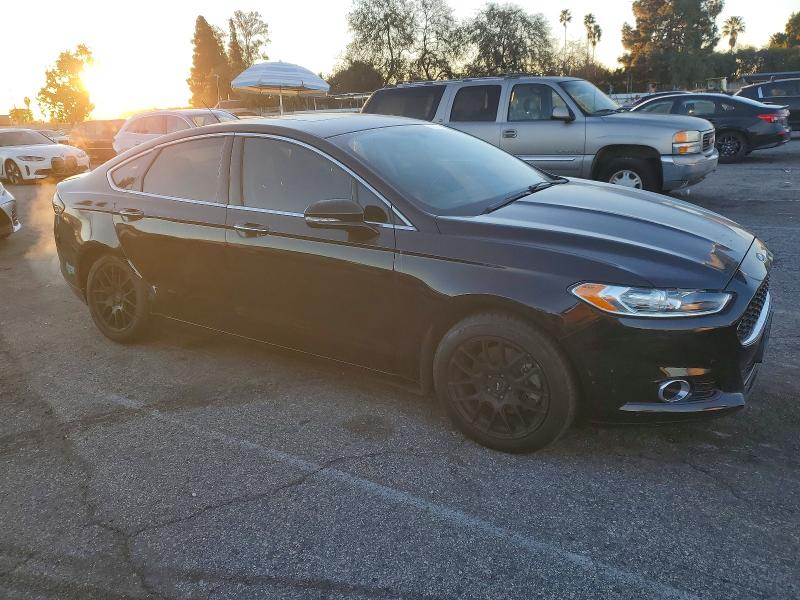 Photo 4 from auction – 2016 FORD FUSION TIT with VIN 3FA6P0SU3GR320841