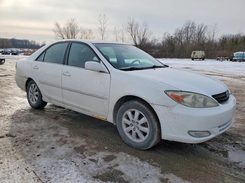 Photo 4 from auction – 2003 TOYOTA CAMRY LE with VIN 4T1BF30K23U036033