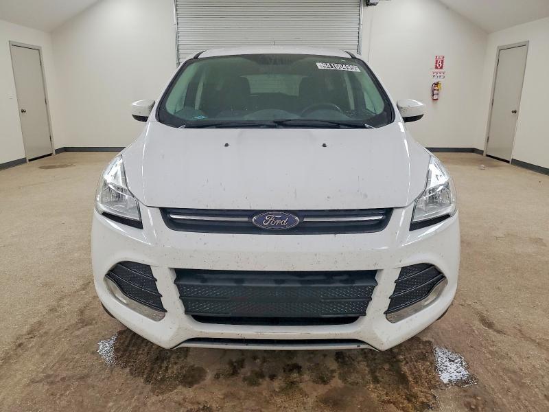 Photo 5 from auction – 2016 FORD ESCAPE with VIN 1FMCU9GXXGUC36811