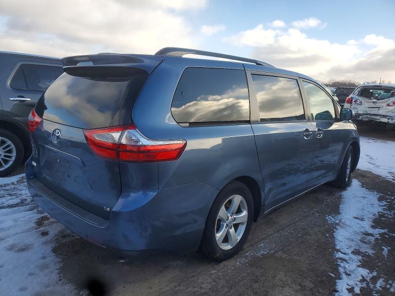 Photo 3 from auction – 2015 TOYOTA SIENNA LE with VIN 5TDKK3DC2FS679199