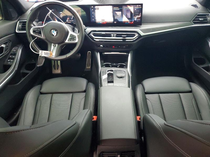 Photo 8 from auction – 2023 BMW 330I with VIN 3MW69FF01P8D43875