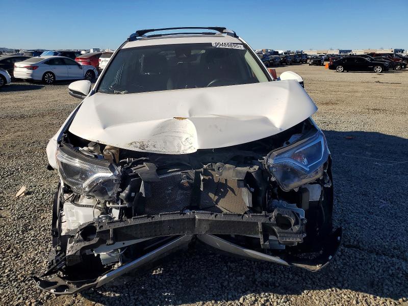 Photo 5 from auction – 2018 TOYOTA RAV4 with VIN 2T3WFREV0JW478689