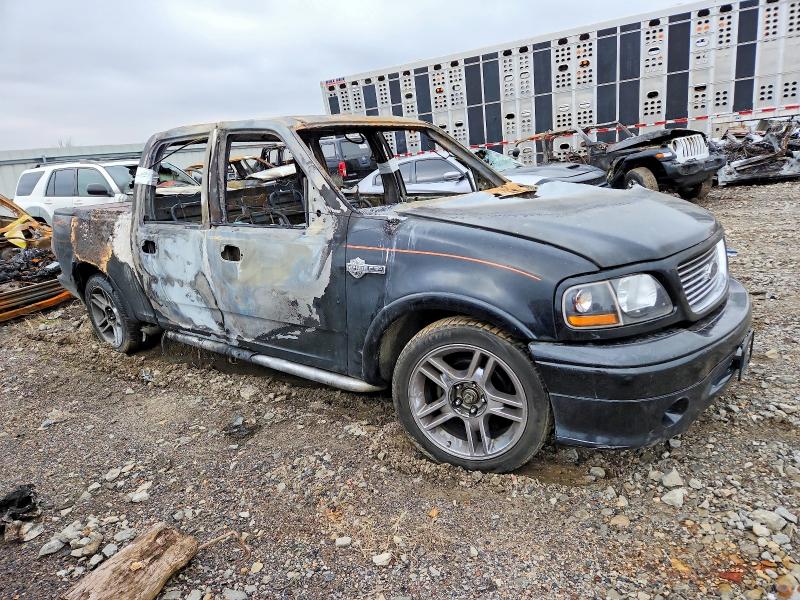 Photo 4 from auction – 2002 FORD F150 SUPER with VIN 1FTRW073X2KC24938