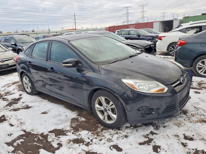 Photo 4 from auction – 2014 FORD FOCUS with VIN 1FADP3F21EL269174