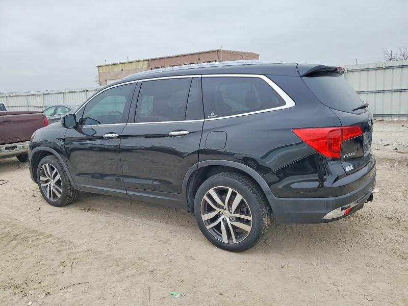 Photo 2 from auction – 2016 HONDA PILOT TOUR with VIN 5FNYF6H98GB060255