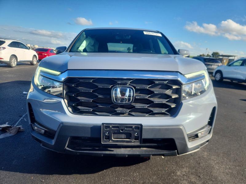 Photo 5 from auction – 2022 HONDA PASSPORT E with VIN 5FNYF8H56NB023288