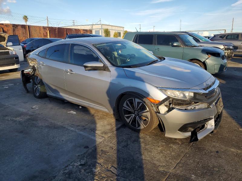Photo 4 from auction – 2016 HONDA CIVIC with VIN 2HGFC1F74GH653885