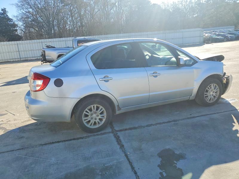 Photo 3 from auction – 2012 SUZUKI SX4 LE with VIN JS2YC5A31C6302484