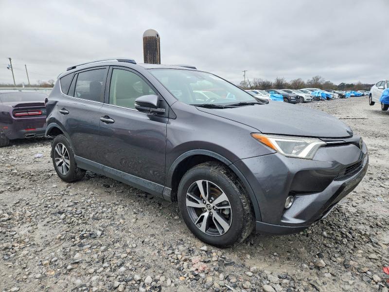 Photo 4 from auction – 2017 TOYOTA RAV4 with VIN JTMWFREV3HJ139773