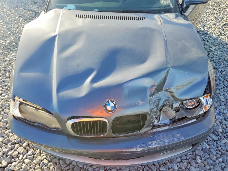 Photo 11 from auction – 2003 BMW 330 CI with VIN WBABS53433JU97619