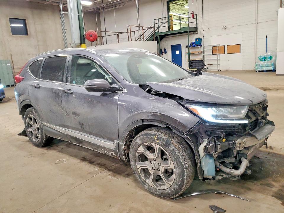 Photo 4 from auction – 2017 HONDA CR-V with VIN 5J6RW2H94HL011978