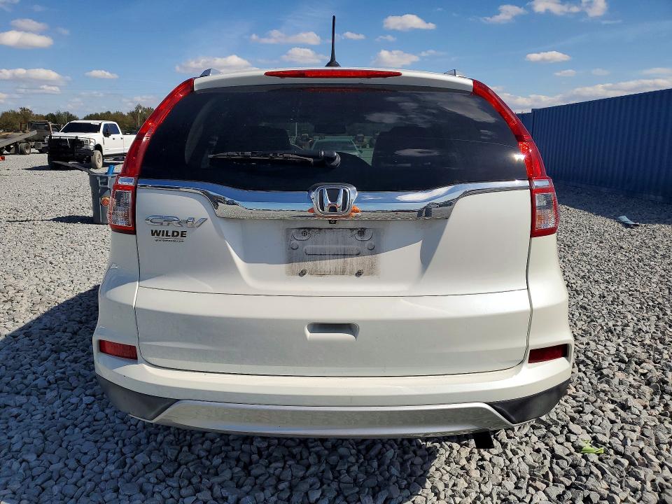Photo 6 from auction – 2016 HONDA CR-V with VIN 5J6RM3H72GL017822