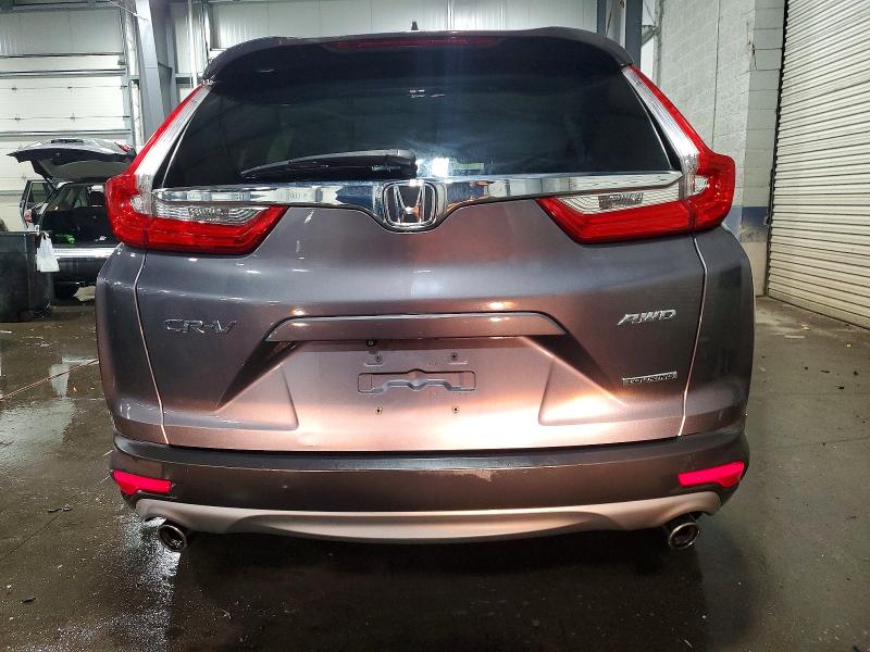 Photo 6 from auction – 2018 HONDA CR-V TOURI with VIN 7FARW2H90JE012791