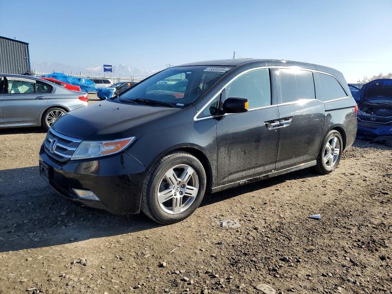 HONDA ODYSSEY TO 2012 with VIN 5FNRL5H92CB066621 - Photo from auction