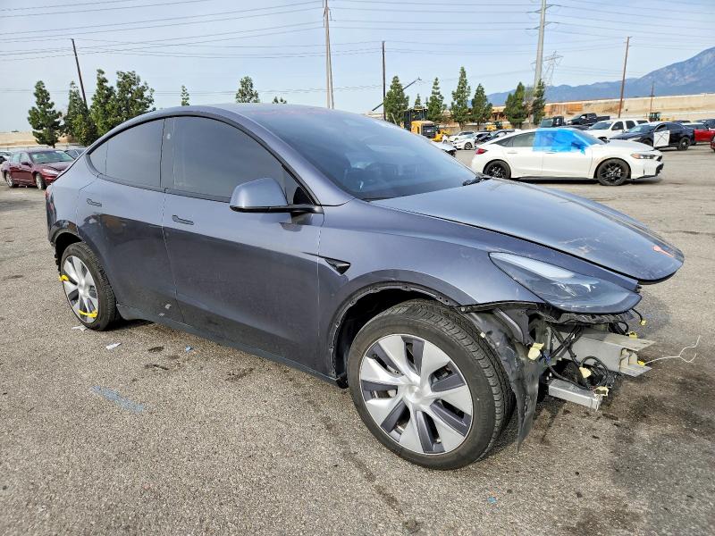 Photo 4 from auction – 2023 TESLA MODEL Y with VIN 7SAYGDED7PF915699