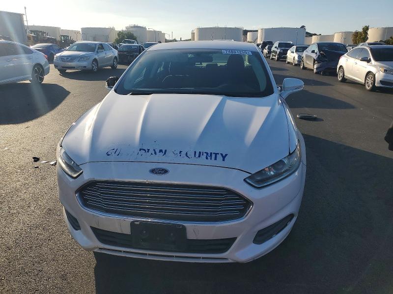 Photo 5 from auction – 2016 FORD FUSION with VIN 3FA6P0H74GR342381