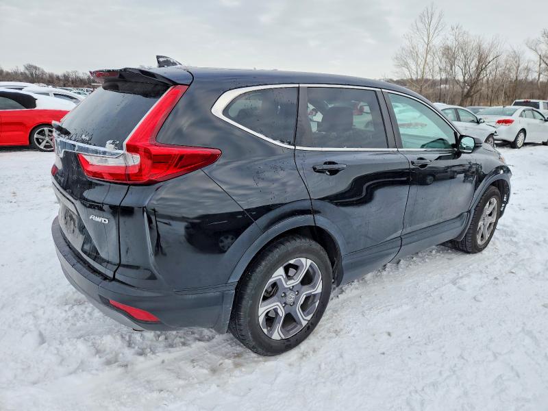 Photo 3 from auction – 2018 HONDA CR-V EXL with VIN 7FARW2H86JE056334