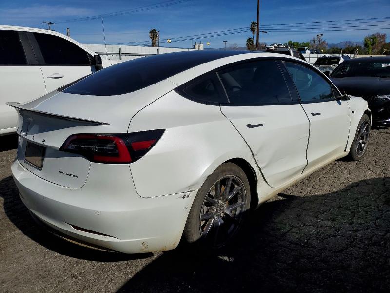 Photo 3 from auction – 2021 TESLA MODEL 3 with VIN 5YJ3E1EB0MF879103