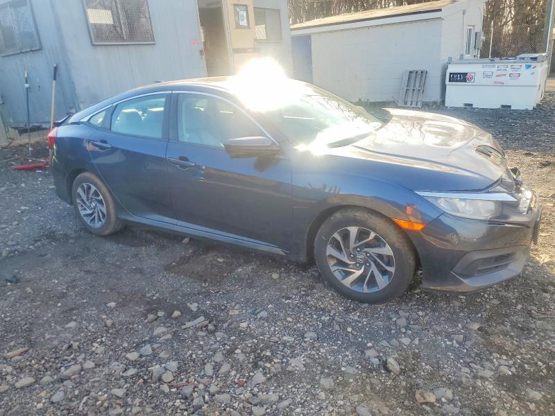 Photo 4 from auction – 2017 HONDA CIVIC EX with VIN 2HGFC2F77HH560480