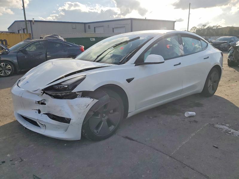 TESLA MODEL 3 2023 with VIN 5YJ3E1EA4PF590334 - Photo from auction