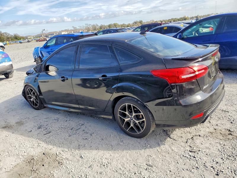 Photo 2 from auction – 2015 FORD FOCUS with VIN 1FADP3F27FL273263
