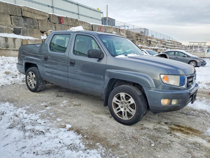 Photo 4 from auction – 2011 HONDA RIDGELINE with VIN 5FPYK1F23BB008164